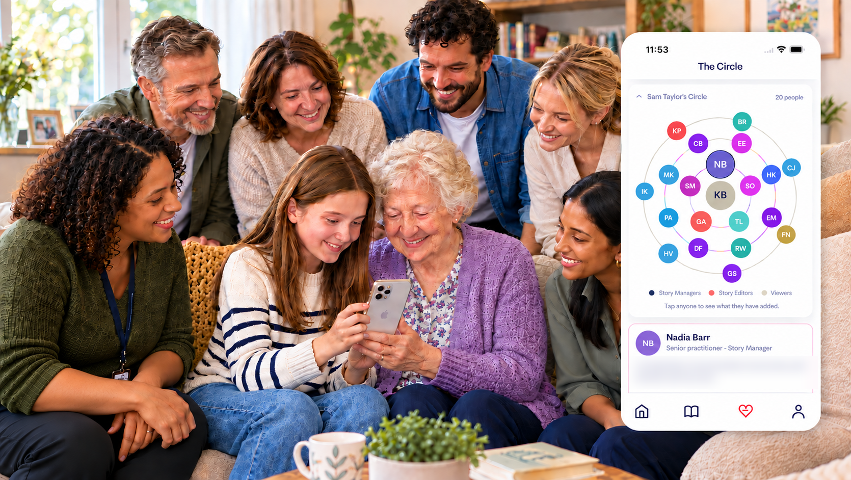Family and carers gathered around a grandmother and granddaughter, with the Storyteller Circle screen alongside